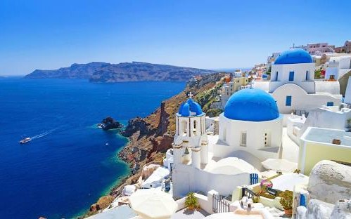 Blue domes above the Santorini caldera