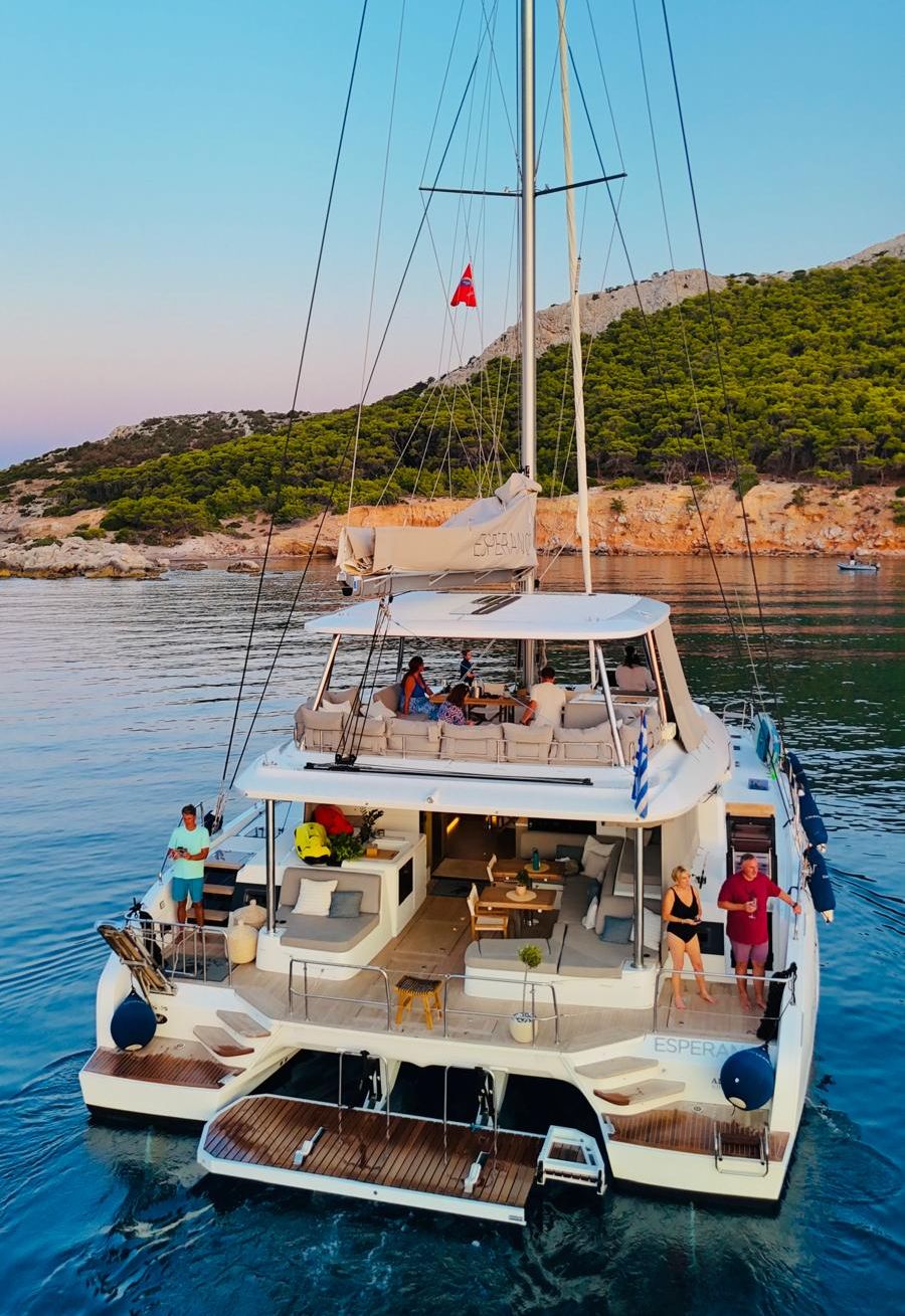 Guests aboard Esperance at sunset